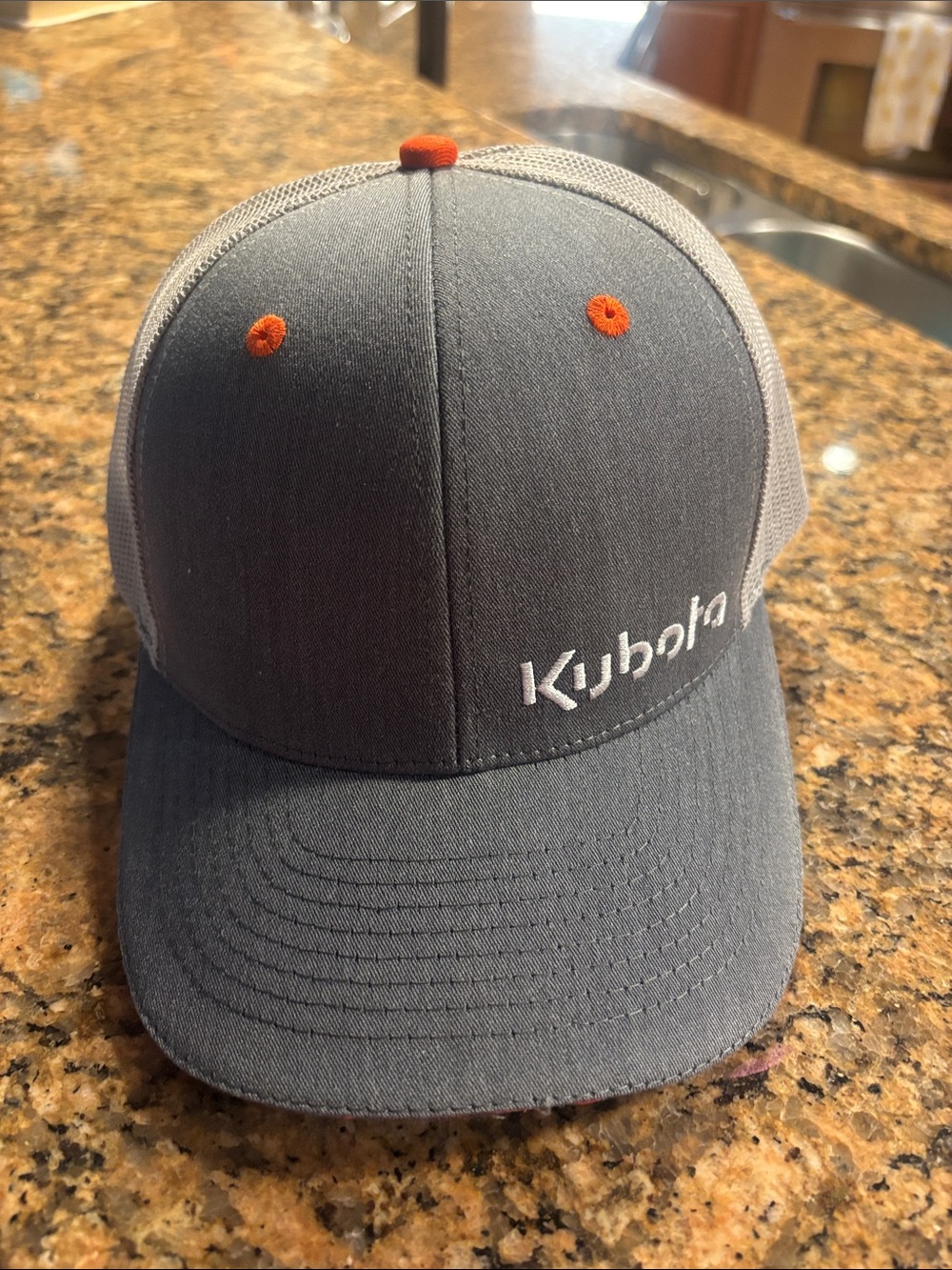 Kubota Gray and Orange Trucker Hat
